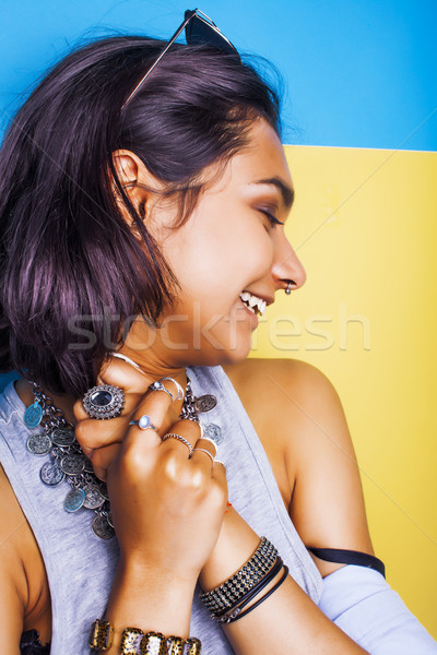 lifestyle people concept. young pretty smiling indian girl with long nails wearing lot of jewelry ri Stock photo © iordani