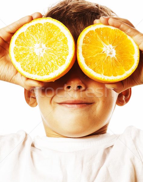 little cute boy with orange fruit double isolated on white smili Stock photo © iordani