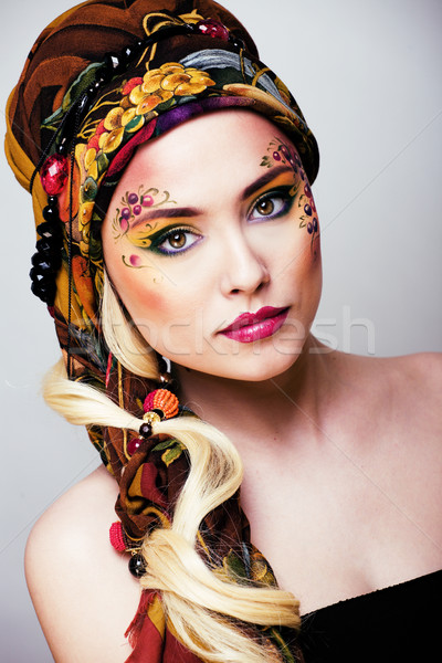 Stock photo: portrait of contemporary noblewoman with face art creative close