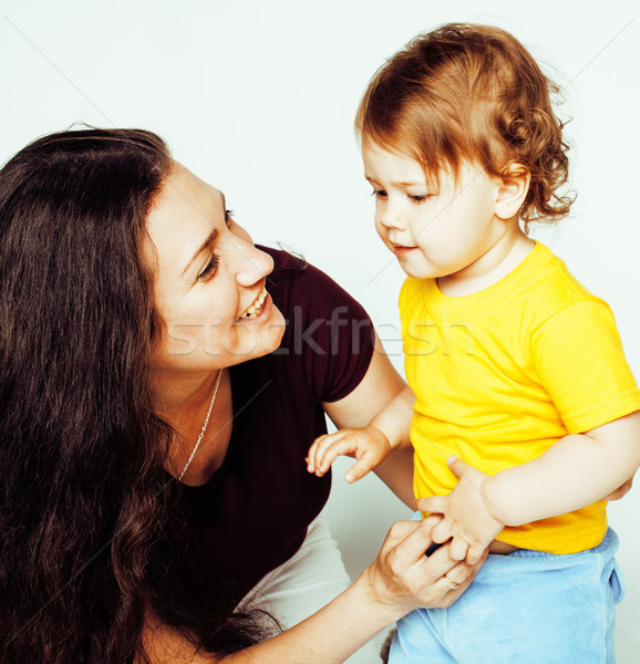pretty real normal mother with cute blond little daughter close up isolated on white background, lif Stock photo © iordani