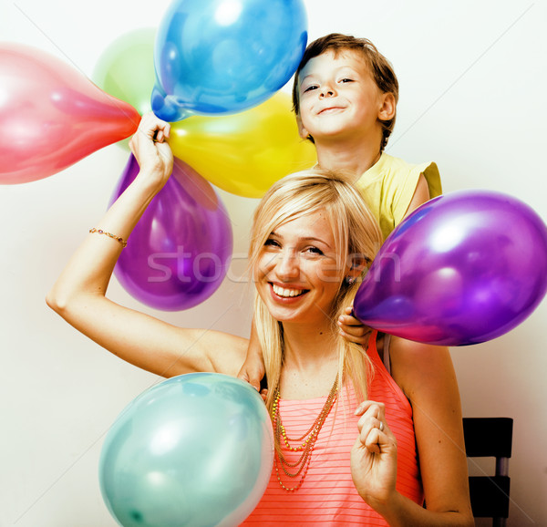 pretty real family with color balloons on white background, blon Stock photo © iordani