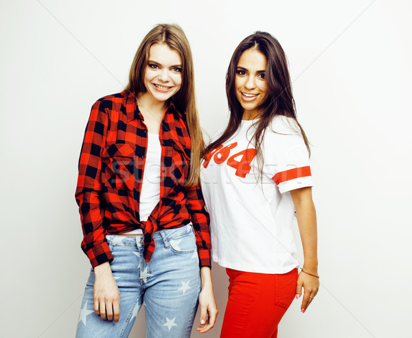 best friends teenage girls together having fun, posing emotional on white background, besties happy  Stock photo © iordani