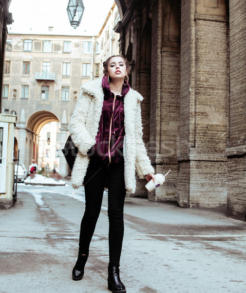 young pretty stylish teenage girl outside on city street fancy f Stock photo © iordani