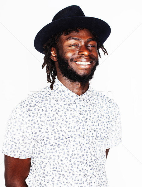 young handsome afro american boy in stylish hipster hat gesturin Stock photo © iordani