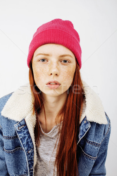 young pretty teenage hipster girl posing emotional happy smiling on white background, lifestyle peop Stock photo © iordani