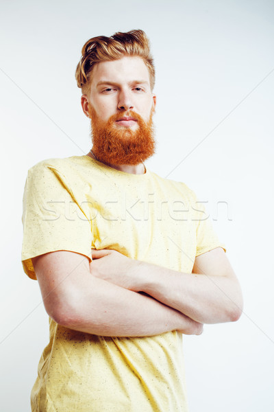 young handsome hipster bearded guy looking brutal isolated on white background, lifestyle people con Stock photo © iordani