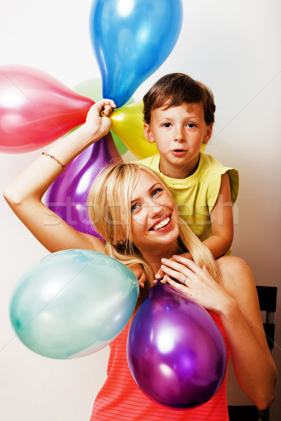 pretty real family with color balloons on white background, blon Stock photo © iordani