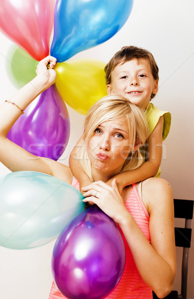 pretty real family with color balloons on white background, blon Stock photo © iordani