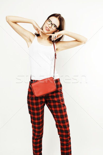 young pretty brunette woman smiling happy on white background, emotional posing wearing hipster glas Stock photo © iordani