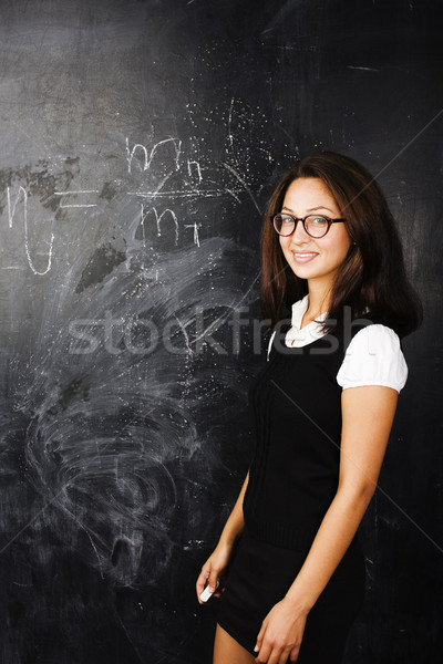 portrait of happy cute student in classroom at blackboard back t Stock photo © iordani