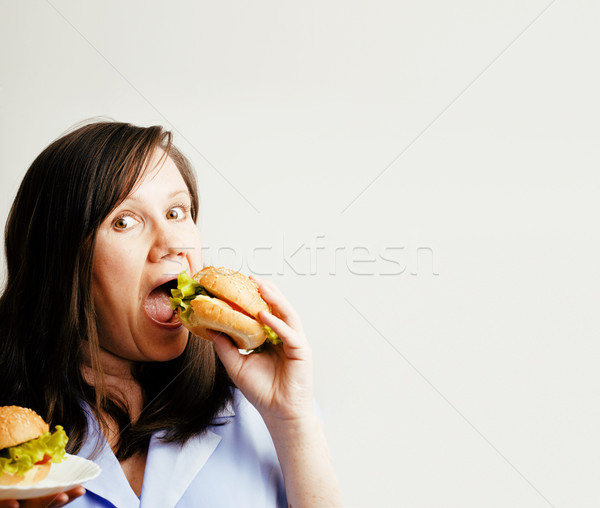 Kövér fehér nő választás hamburger saláta Stock fotó © iordani