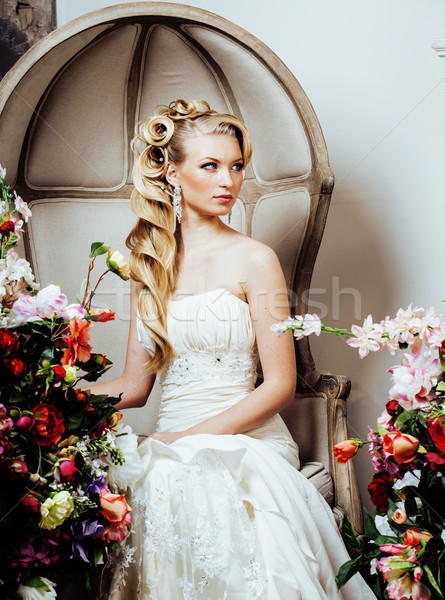 beauty young blond woman bride alone in luxury vintage interior with a lot of flowers  Stock photo © iordani