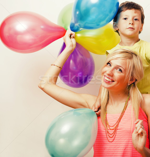 pretty real family with color balloons on white background, blon Stock photo © iordani