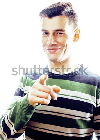 Portrait of a smart serious young man standing against white bac Stock photo © iordani