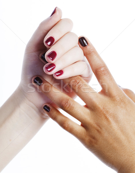 Manicured hands on white isolated, african with caucasian close up, connection diverse people concep Stock photo © iordani