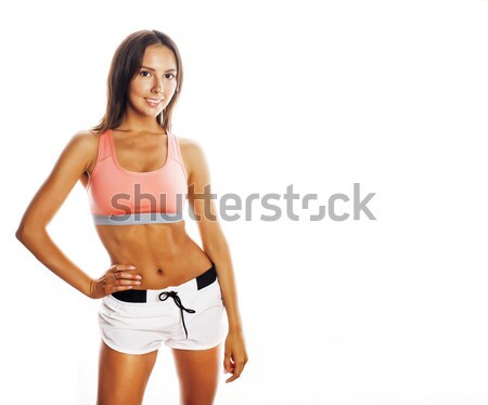 young pretty woman in sports wear isolated on white smiling Stock photo © iordani