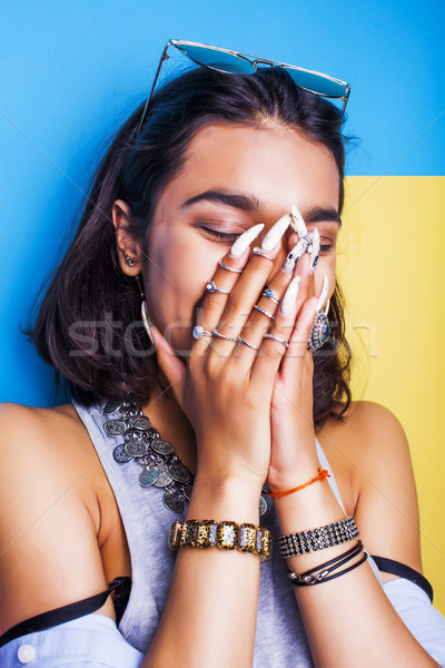 lifestyle people concept. young pretty smiling indian girl with long nails wearing lot of jewelry ri Stock photo © iordani