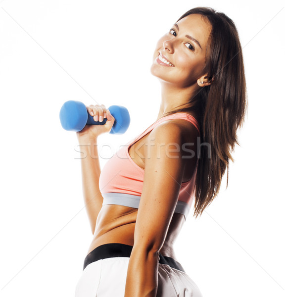 young pretty slim woman with dumbbell isolated Stock photo © iordani
