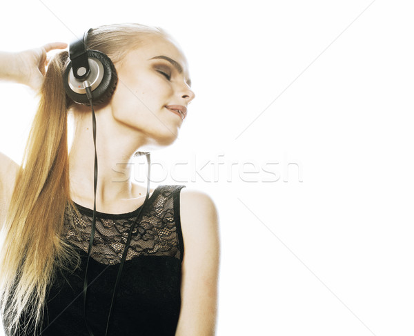 Genç tatlı yetenekli genç kız kulaklık şarkı söyleme Stok fotoğraf © iordani