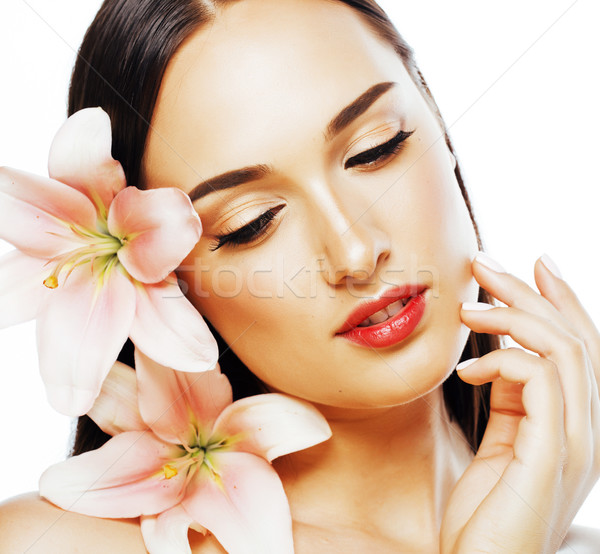young attractive lady close up with hands on face isolated flower lily tender concept Stock photo © iordani