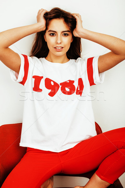 young pretty stylish hipster girl posing emotional isolated on white background happy smiling cool s Stock photo © iordani