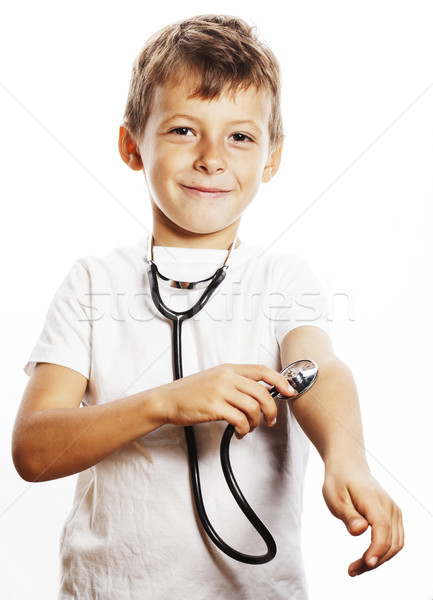 little cute boy with stethoscope playing like adult profession d Stock photo © iordani