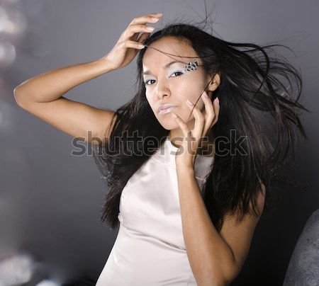 Stock photo: young pretty brunette woman fashion dressed, bright makeup, eleg
