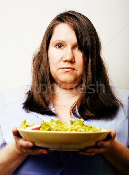Grăsime alb femeie alegere hamburger salată Imagine de stoc © iordani