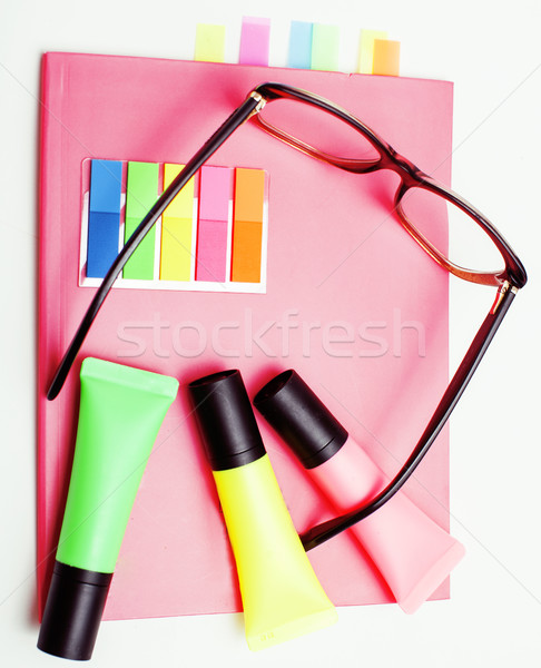 business, education and technology concept - close up of notebook, paper stickers, pencil different  Stock photo © iordani