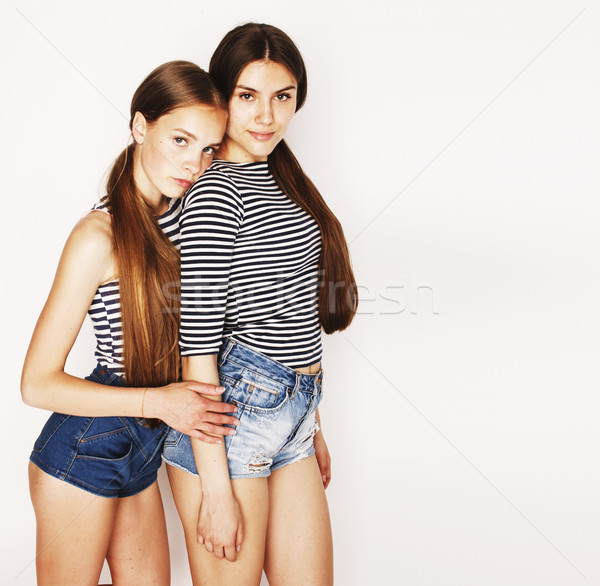 Foto stock: Dos · cute · adolescentes · junto · aislado