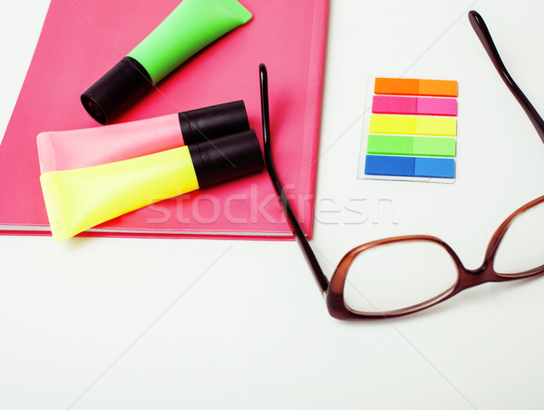 business, education and technology concept - close up of notebook, paper stickers, pencil different  Stock photo © iordani