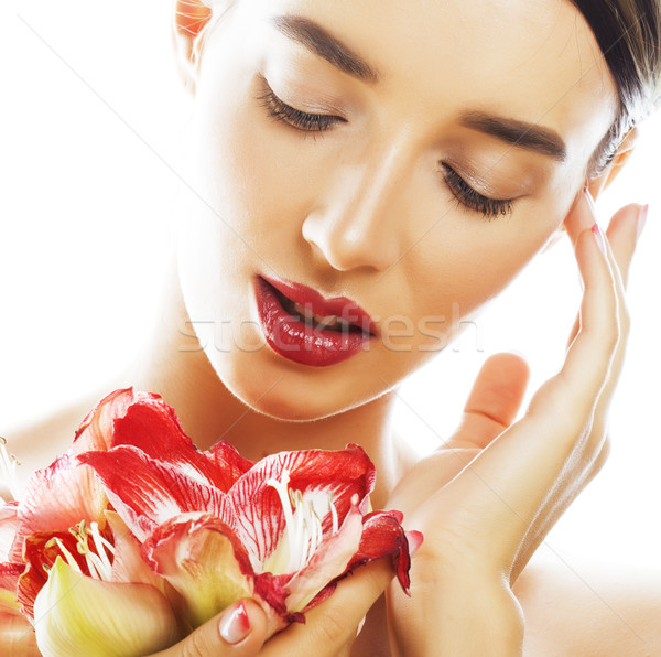 young pretty brunette woman with red flower amaryllis close up i Stock photo © iordani