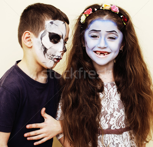 Stock photo: zombie apocalypse kids concept. Birthday party celebration facepaint on children dead bride, scar fa