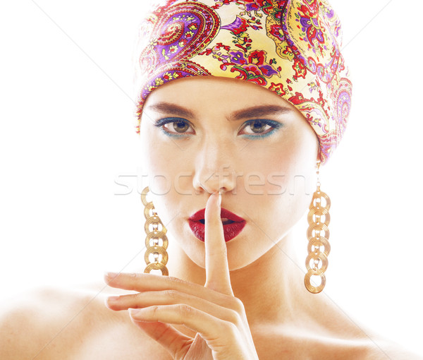 young pretty modern girl with bright shawl on head emotional posing isolated on white background, as Stock photo © iordani