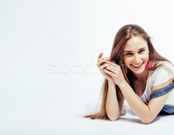 young pretty stylish brunette hipster girl posing emotional isolated on white background happy smili Stock photo © iordani