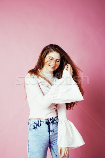 cute pretty redhair teenage girl smiling cheerful on pink background, lifestyle modern people concep Stock photo © iordani