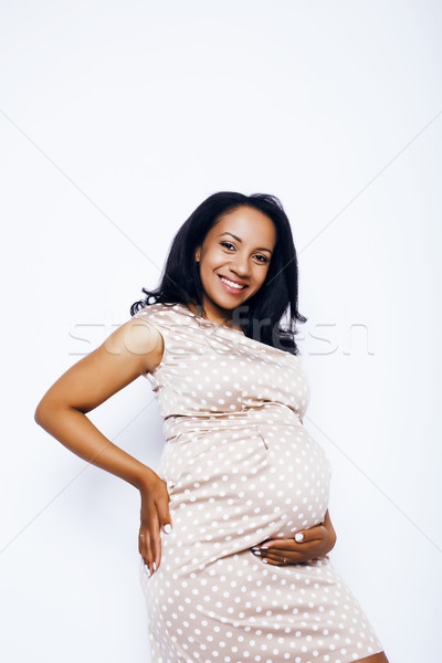 young pretty african american woman pregnant happy smiling, posing on white background isolated , li Stock photo © iordani