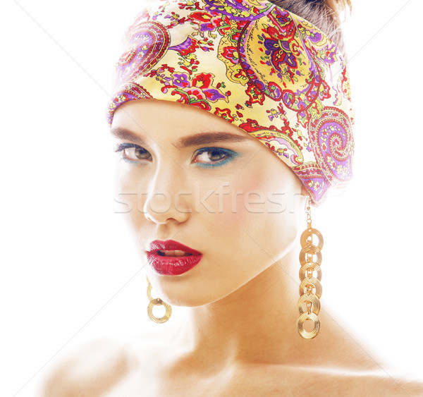 young pretty modern girl with bright shawl on head emotional posing isolated on white background, as Stock photo © iordani
