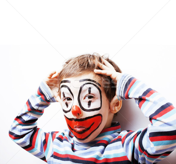 little cute boy with facepaint like clown, pantomimic expression Stock photo © iordani