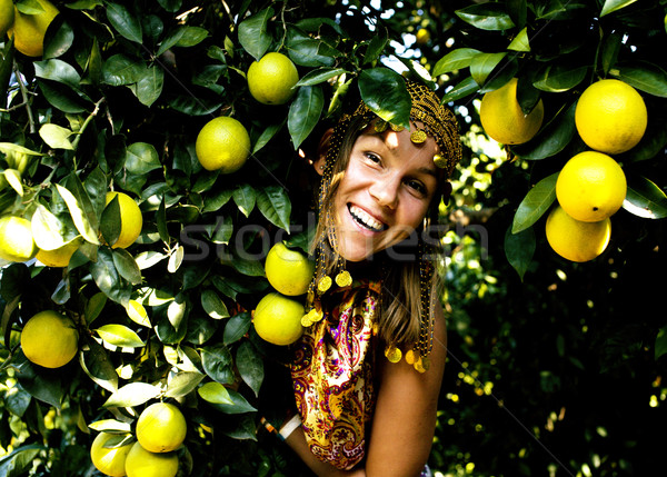 pretty islam woman in orange grove smiling, real muslim girl che Stock photo © iordani