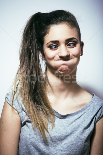 problem depressioned teenage with messed hair and sad face, real Stock photo © iordani