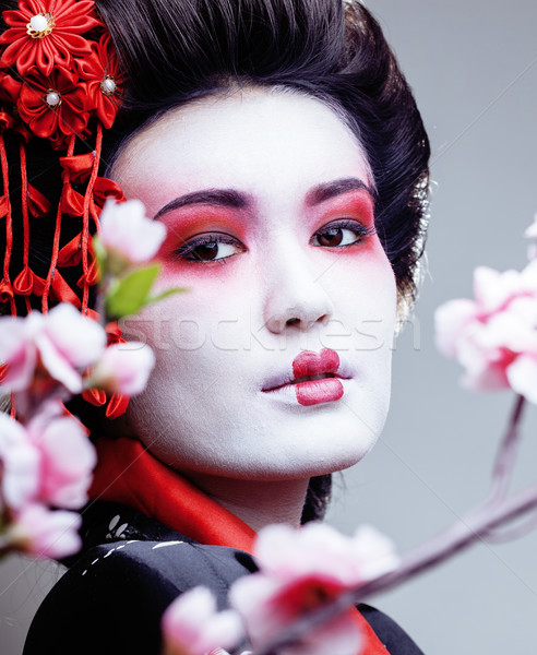 Stockfoto: Jonge · mooie · geisha · zwarte · kimono · sakura