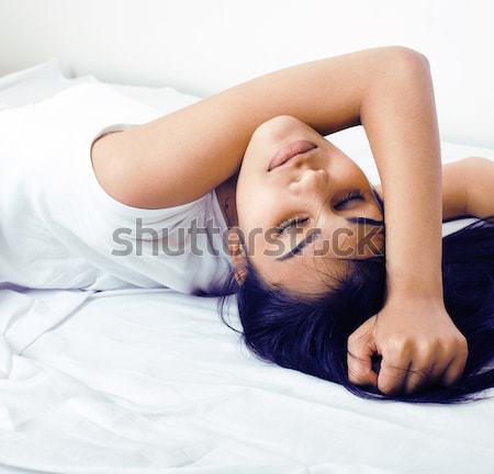 Сток-фото: молодые · довольно · женщину · кровать · белый