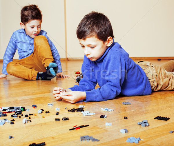 Komik sevimli çocuklar oynama lego ev Stok fotoğraf © iordani