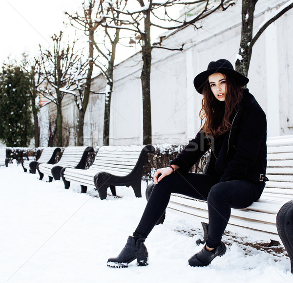 young pretty teenage hipster girl outdoor in winter snow park having fun drinking coffee, warming up Stock photo © iordani