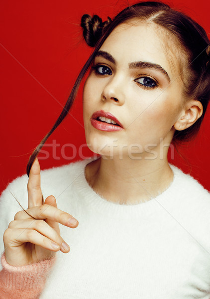 young pretty emitonal posing teenage girl on bright red background, happy smiling lifestyle people c Stock photo © iordani