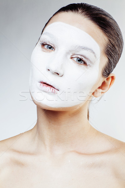Genç güzel kadın beyaz maske yalıtılmış Stok fotoğraf © iordani