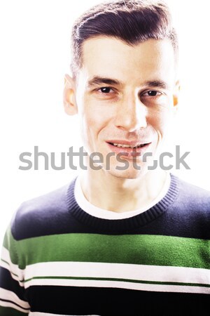 Portrait of a smart serious young man standing against white bac Stock photo © iordani