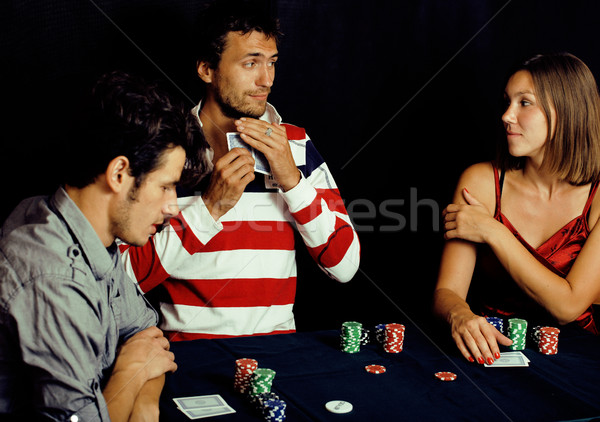 Stock photo: young people playing poker off-line tournament, friends party co