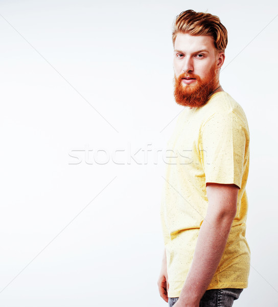 young handsome hipster ginger bearded guy looking brutal isolate Stock photo © iordani